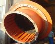 Discharge trunnion liner